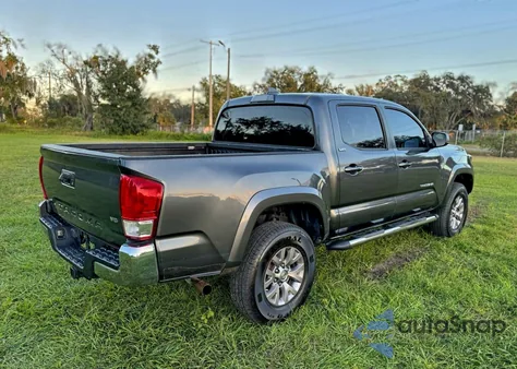 2016 Toyota Tacoma Double Cab z USA, uszkodzony, nr VIN 3TMAZ5CN2GM017548